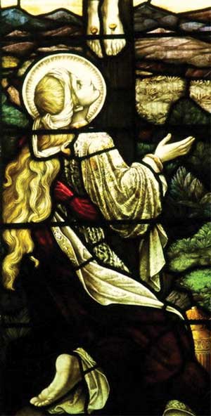 Magdalene at the crucifixion... A church window in Dorset Village, UK